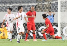 （体育）足球——东亚杯：中国队不敌日本队